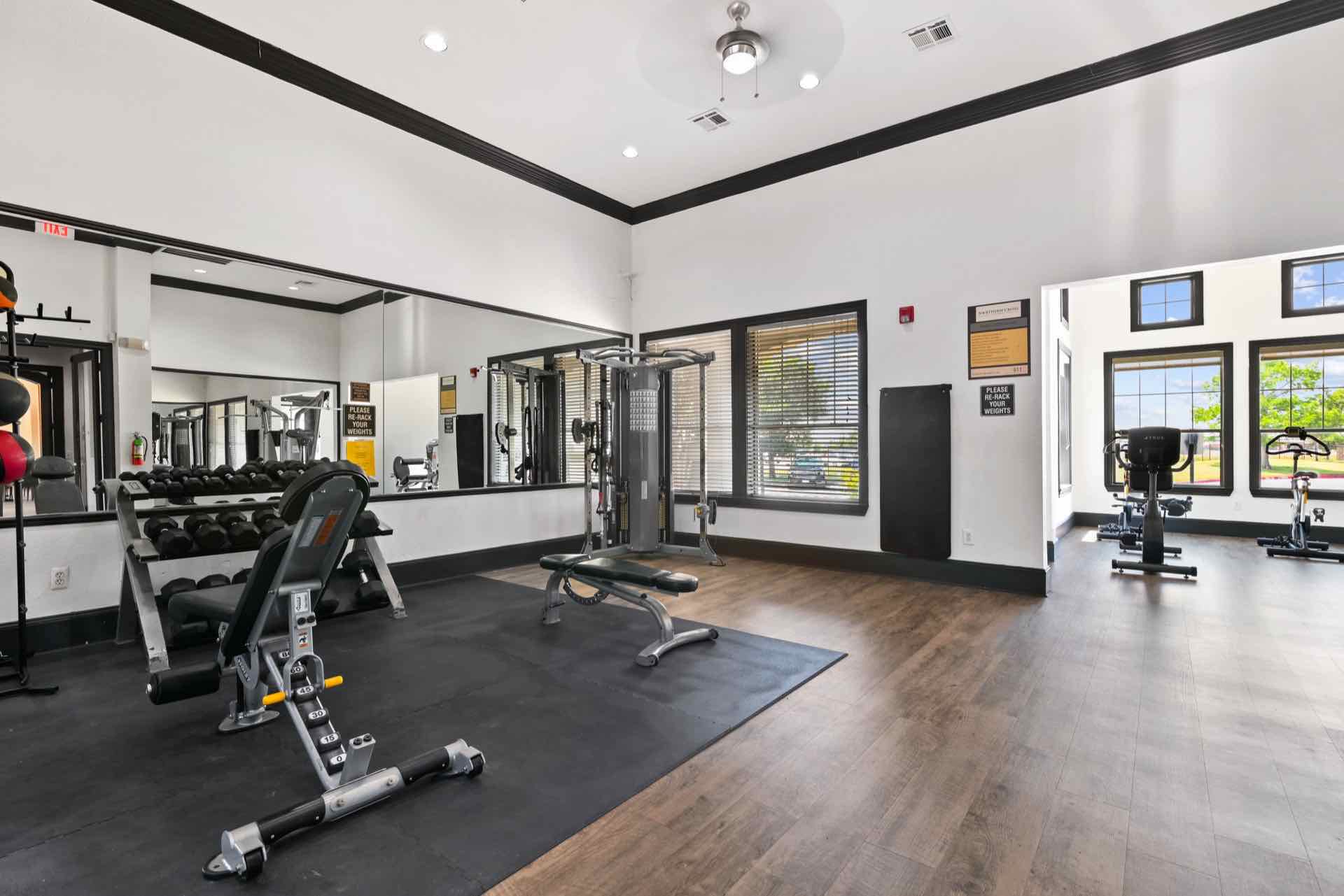 Fitness center with cardio and weight equipment 